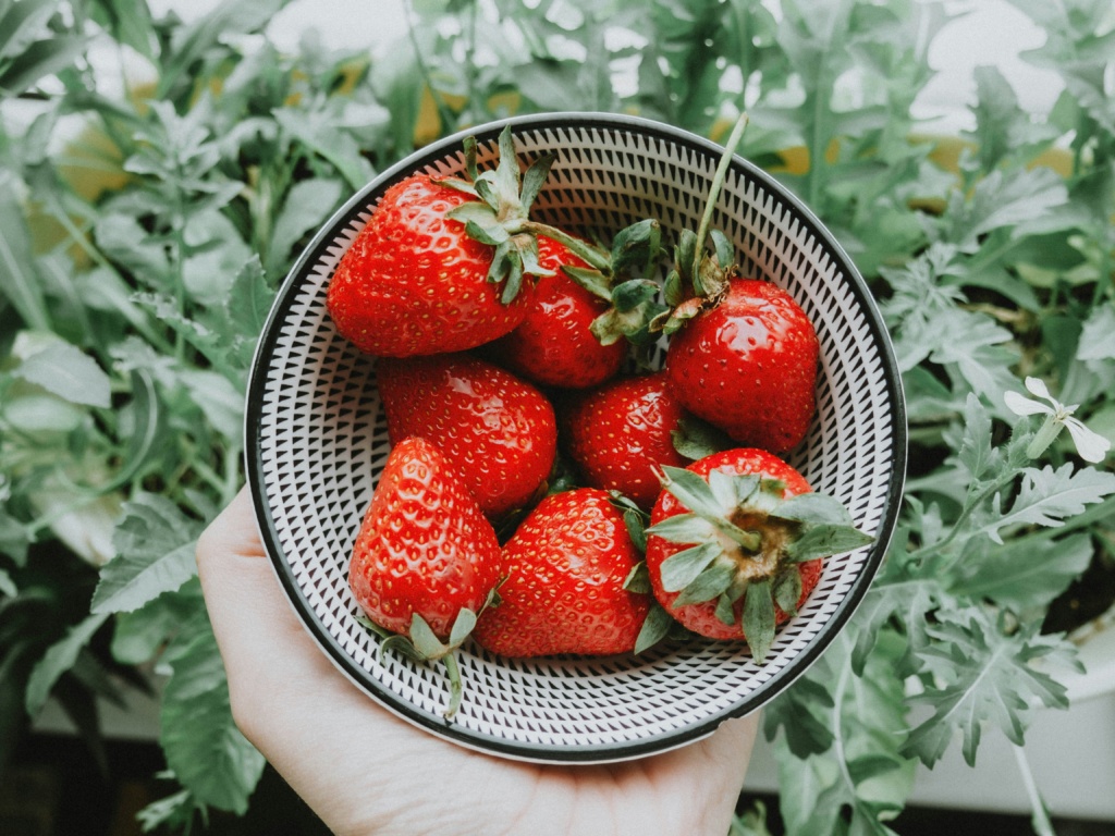 Strawberries help with clearing acne.